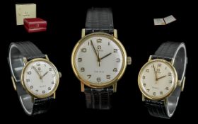 Omega Genève Gents Gold Plated Mechanical Wind Wrist Watch on original Omega signed watch strap,