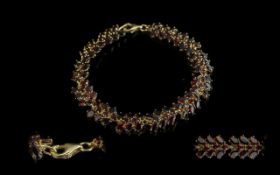 Ladies - Excellent Quality 18ct Gold Fire Garnet Set Bracelet. Marked 950 - 18ct. The Well Matched