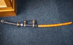 Decorative Oriental Display Cutlass in leather case with decorative blue and gold handle. Heavy