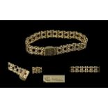 Ladies Attractive and Well Made 9ct Gold Kisses x Bracelet. Fully Hallmarked. Hallmark London