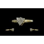 18ct Gold - Attractive Contemporary Diamond Set Dress Ring. Marked 750 - 18ct to Shank. The Diamonds