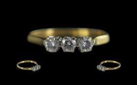18ct Gold Attractive 3 Stone Diamond Set Ring, marked 750 - 18ct to shank. The three round cut