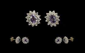 9ct Gold Pair of Crystal & Lilac Stone Set Stud Earrings, for pierced ears.