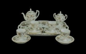 Antique Cabaret Set in White and Gilt, delicate tea pot, lidded sugar bowl on pedestal, and four