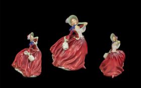 Royal Doulton Hand Painted Porcelain Figure ' Autumn Breezes ' Style One. HN1934. Designer L.