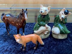 Two Staffordshire Fox Figures, lady and gentleman, 9'' high. Together with a brown gloss Beswick