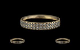 18ct Gold - Diamond Set Band Ring ( Superior ) Marked 18ct to Shank. The Well Matched Diamonds of