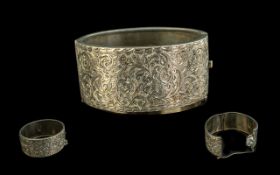 Large Edwardian Silver Hinged Bangle with safety chain, an impressive piece of jewellery with floral