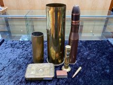 Collection of Trench Art, to include a 1914 Christmas tin, and four shell cases of various sizes,