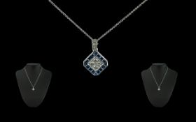 Ladies 18ct White Gold Diamond & Blue Sapphire Set Pendant Drop - With attached White Gold Chain.