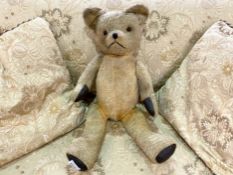 Early 20th Century Jointed Teddy Bear. 1920's Straw Filled Teddy Bear, moveable joints, padded paws,
