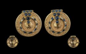 Pair 18ct Sapphire & Diamond Brooches, circular target form set with alternative round diamonds
