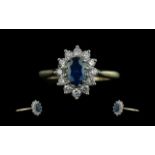 Ladies Attractive 18ct Gold Sapphire & Diamond Set Cluster Ring, flowerhead setting, marked 18ct