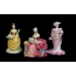 Three Porcelain Lady Figurines, comprising Royal Doulton 'Penelope', Coalport 'Winning Stroke' by