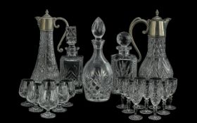 Quantity of Quality Glass Ware, comprising three decanters with stoppers, two water jugs with pewter