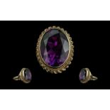 Ladies Attractive 9ct Gold Single Stone Amethyst Dress Ring, the large oval faceted Amethyst of