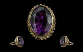 Ladies Attractive 9ct Gold Single Stone Amethyst Dress Ring, the large oval faceted Amethyst of