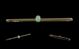 Antique 9ct Gold Opal Bar Brooch, in fitted case, 2.5 inches long; the opal of lovely quality and