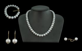 Set of 18ct Silver Pearls, comprising necklace 16'' long, a matching bracelet and drop earrings