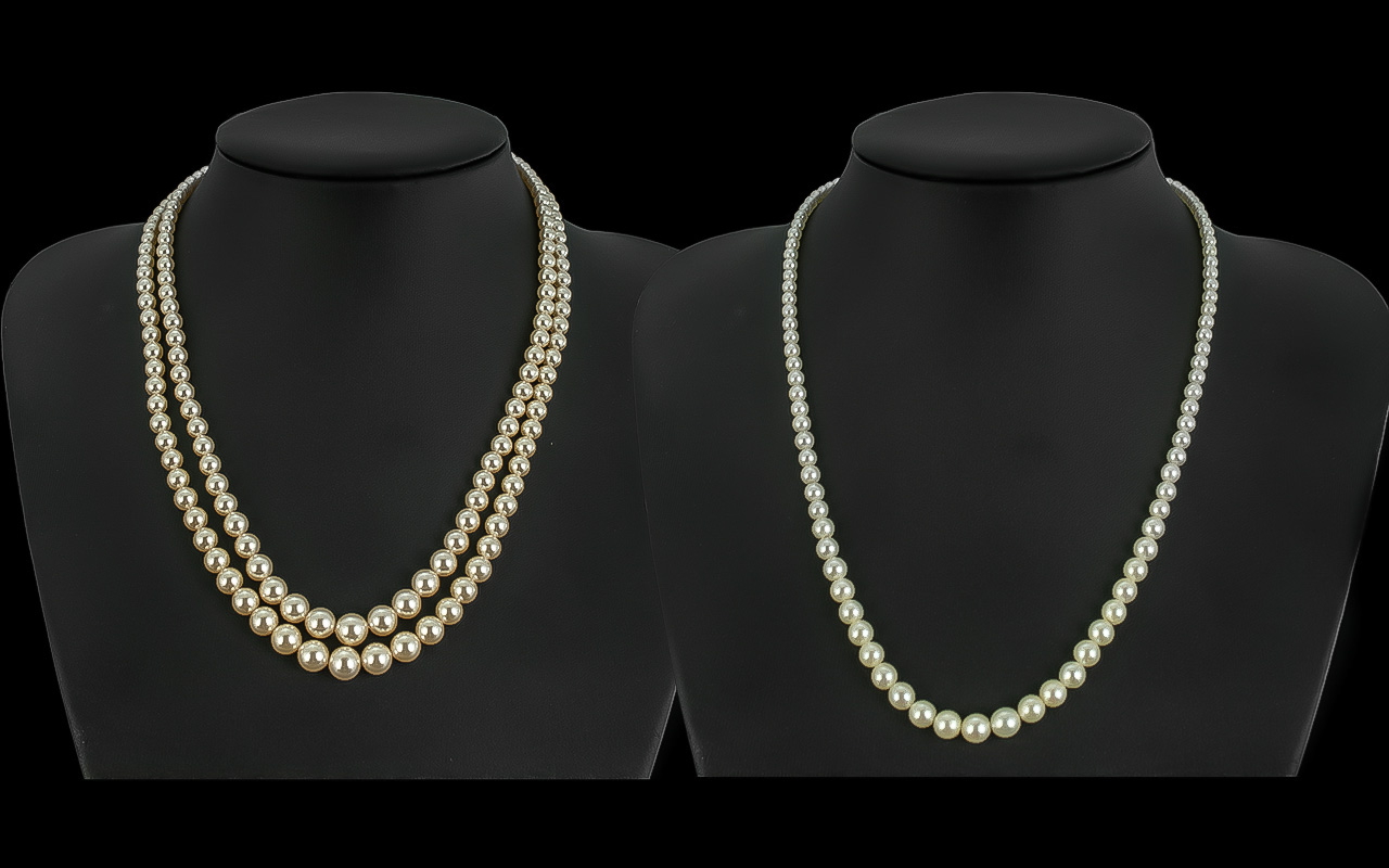 Two Strings of Vintage Pearls to include one with silver and marquisette clasp and the other a Lotus