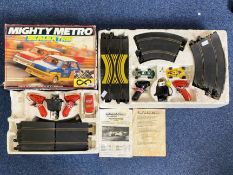 Two Boxes Scalextric, comprising Mighty Metro in box, missing one car, plus one other, both as