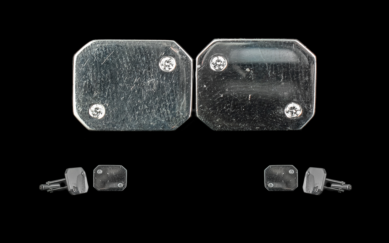 9ct White Gold Diamond Set Cuff Links, each set with two round cut diamonds. Weight 9.10 grams.