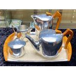 Vintage (1950s) Picquot Ware Five Piece Tea Set, comprising a large tea pot, hot water/coffee pot,