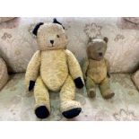 Two Vintage Teddy Bears, one 1920's, one mid-century. Largest measures 24'', smaller 16''.