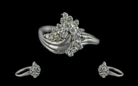 Ladies 18ct White Gold Diamond Set Dress Ring, marked 750 to shank. The round faceted diamond of