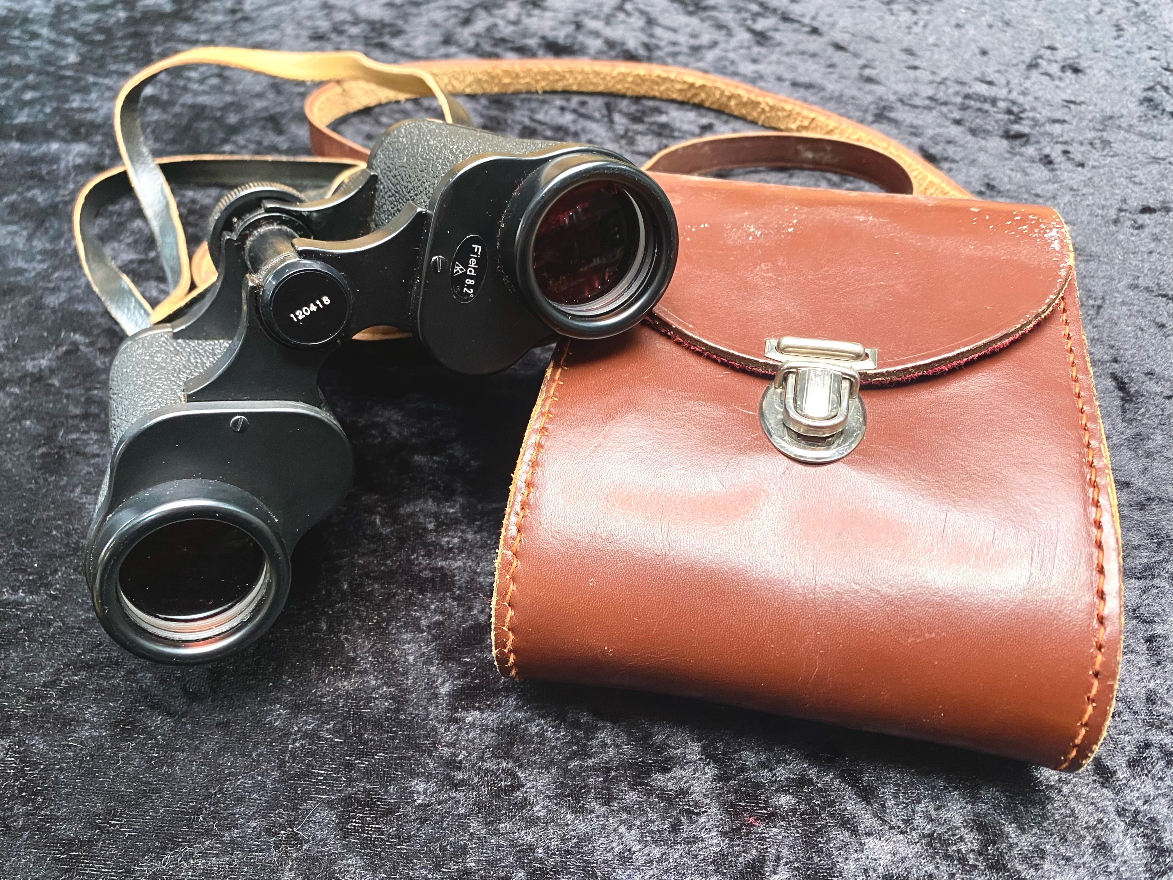 Pair of Antique WWI Octra Binoculars, No. 11054, 10 x 50. Strong leather case, red lining. Good