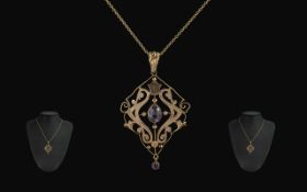 Antique Period Attractive 9ct Gold Openwork Pendant Drop set with amethysts, marked 9ct; weight