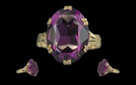 Ladies Attractive 9ct Gold Single Stone Amethyst Set Ring - Marked 9ct to Shank. The Large Faceted