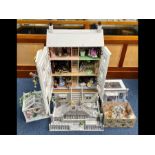 A Four Storey Mansion Dolls House, Painted In White with Lights. With Black Painted Front Door on an