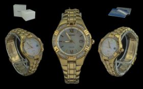 Ladies Seiko Solar Wristwatch, Mother Of Pearl Dial With Date Aperture, Diamond Set Bezel, Gold