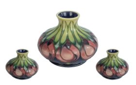 Moorcroft Modern Tube lined Hand Painted Onion Shaped Vase ' April Tulip ' Design. Date 2003.