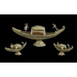 Novelty Musical Jewellery Box in the Form of a Gondola, with a gondolier and a lady, the centre a