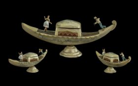 Novelty Musical Jewellery Box in the Form of a Gondola, with a gondolier and a lady, the centre a