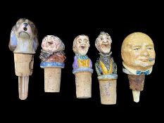 Collection of Novelty Wine Stoppers including a rare 'Winston Churchill', the collection of five