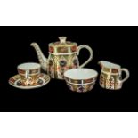 Miniature Royal Crown Derby Coffee Set, XLIV 1128, comprising a coffee pot, milk jug, sugar bowl and