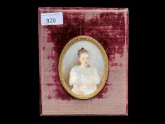 Early 20th Century Portrait Miniature, depicts a young girl in lace dress, housed in a velvet