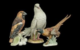 Three Goebel Bird Figures, comprising a Pheasant No CV120, 6'' tall, Dove Pigeon 38155, 8'' tall,