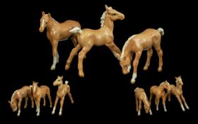 Three Beswick Palomino Ponies, tallest 5'' high, all marked Beswick to base.