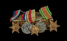 Military Interest. Two WWI Medals together with Africa, Italy and The 1939-1945 Star. Housed in a