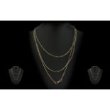 Antique Period Attractive 15ct Gold Long Chain, marked 15ct, excellent design and length,