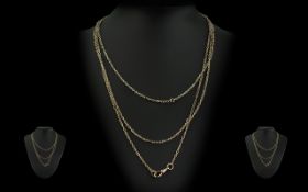 Antique Period Attractive 15ct Gold Long Chain, marked 15ct, excellent design and length,