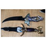 Two Heavy Good Quality Fantasy Oriental Decorative Display Daggers, one with a handle depicting a