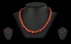 Early 20th Century Pink Salmon Mediterranean Coral Double Knotted Necklace. A Double Knotted