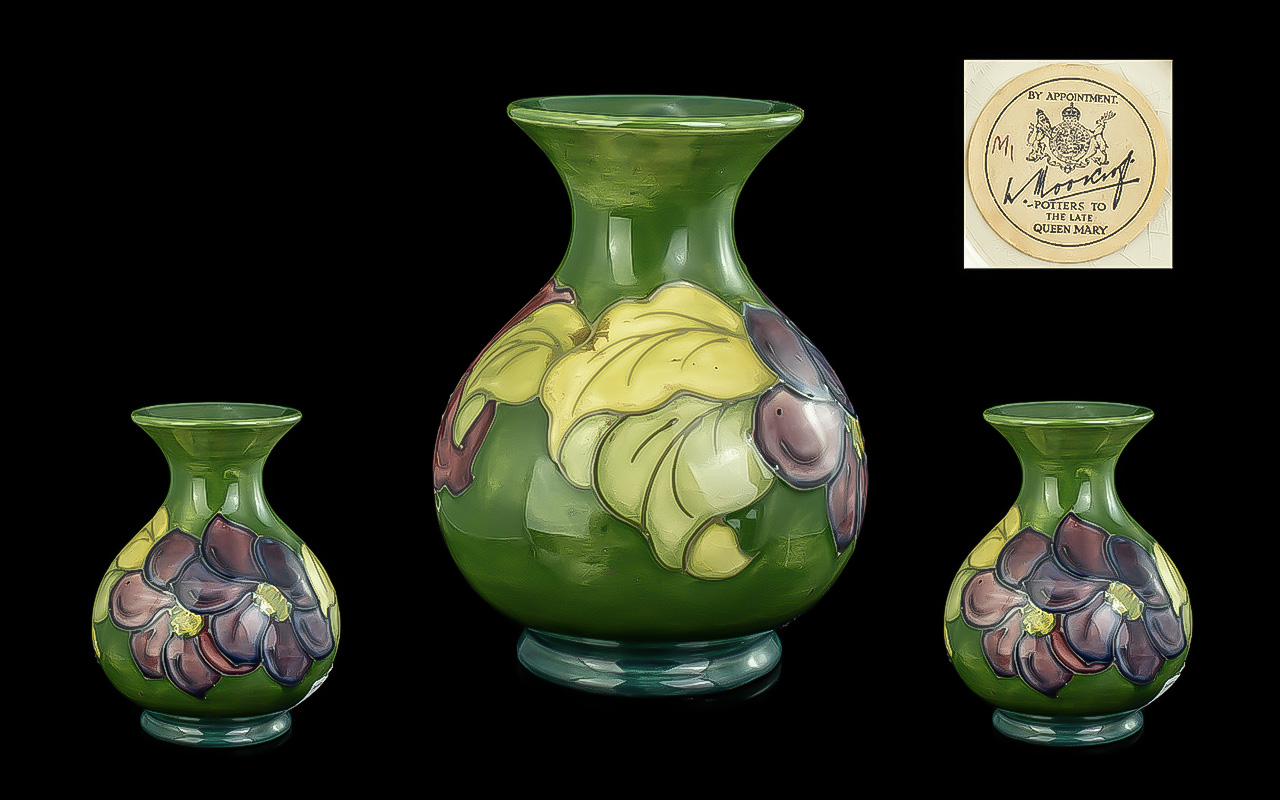 Moorcroft Vase, measures 5.5'' high, Hibiscus vase, of baluster form, yellow, purple and red flowers