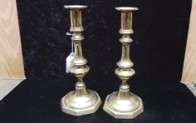 Pair of 19th Century Brass Candlesticks, measure 9'' high. Traditional style.