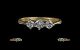 18ct Gold - Pleasing 3 Stone Diamond Set Ring. Marked 18ct to Shank. The 3 Diamonds of Good Colour
